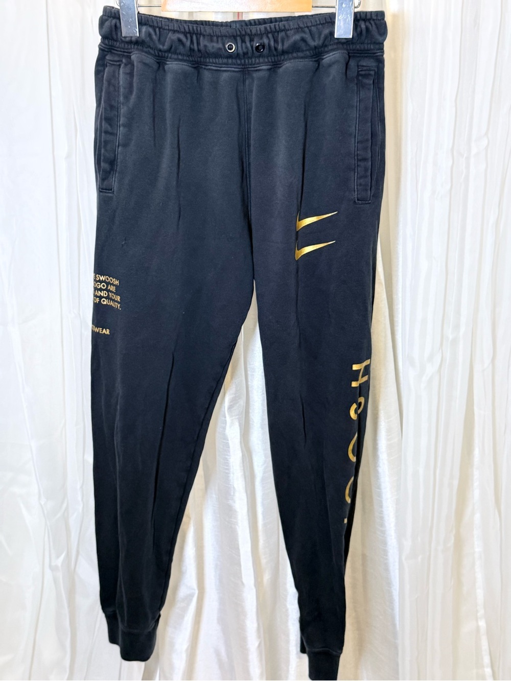 Nike Black Jogger Sweatpants with Gold Logo Accents